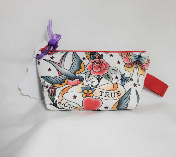 zippered bag with bird and true love banner
